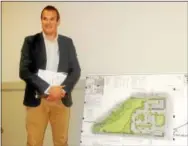  ?? FRAN MAYE — DIGITAL FIRST MEDIA ?? Mike Pia Jr. displays a sketch plan of a complex soon to be developed off Mill Road in Kennett Square.