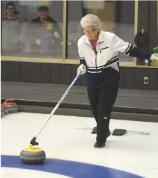  ??  ?? Mickey Gower shows off her curling stick delivery.