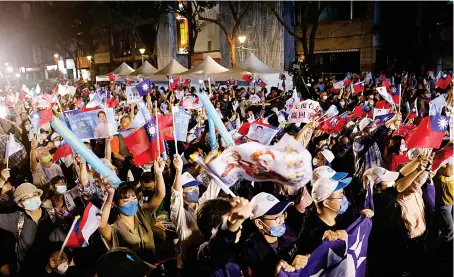  ?? Reuters ?? Supporters of the opposition party Kuomintang during a rally in Taipei. Taiwan is facing key problems, including concerns about threats from China.