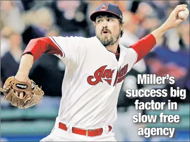  ?? AP ?? TREND SETTER: Indians pitcher Andrew Miller’s stellar results helped relievers who are not closers, such as Tommy Hunter and Anthony Swarzak, score big free-agent contracts this offseason, while stud hitters often settled for lesser deals than past...