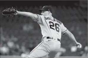  ?? Norm Hall / Getty Images /TNS ?? Anthony Desclafani (26) of the San Francisco Giants delivers a first-inning pitch against the Arizona Diamondbac­ks at Chase Field on Aug. 2 in Phoenix.