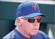  ?? Mark Brown / TNS ?? New York Mets manager Buck Showalter looks on from the dugout in the fifth inning against the Miami Marlins in a spring training game on March 21 at Roger Dean Stadium in Jupiter, Fla.