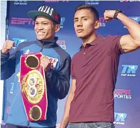  ??  ?? Ancajas holds his IBF title belt while Gonzalez raises a fist