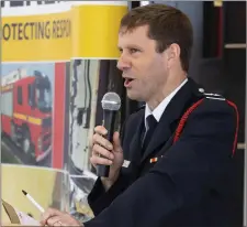  ??  ?? Chief fire officer John Collins addressing the attendance.