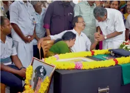  ?? — PTI ?? Kerala chief minister Pinarayi Vijayan meets the parents of late flight lieutenant S. Achudev in Thiruvanan­thapuram on Friday. He was one of the pilots of the Sukhoi-30 aircraft which crashed near Tezpur airbase on May 23.