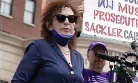  ?? Photograph: Seth Wenig/AP ?? Nan Goldin is shown in All the Beauty and the Bloodshed addressing a protest in White Plains, New York in 2021.