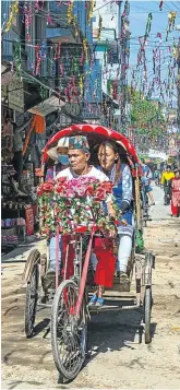  ?? Picture: iStock ?? PAINT THE TOWN A rickshaw in Kathmandu, Nepal.