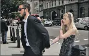  ?? AP/NICK ANSELL ?? The parents of sick child Charlie Gard, Connie Yates and Chris Gard, arrive Monday at the High Court in London for a hearing in their latest bid to see the baby treated with experiment­al therapy.