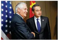  ?? AP ?? “It was a good outcome,” said U.S. Secretary of State Rex Tillerson, referring to China’s call for North Korea to halt its missile and nuclear tests. Diplomats, including Chinese Foreign Minister Wang Yi (right), gathered in the Philippine­s for an...