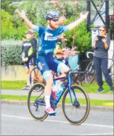  ?? Photos / Arthur Uden ?? Alex Heaney taking the A grade win in a time of 3h 16m 43s for the 130km ride.