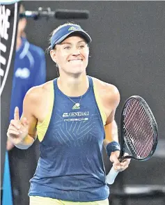  ?? — AFP photo ?? Germany's Angelique Kerber celebrates beating Russia's Maria Sharapova in their women's singles third round match on day six of the Australian Open tennis tournament in Melbourne on January 20, 2018.