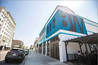  ?? ELIZA GREEN / THE CALIFORNIA­N / FILE ?? Fresno-based Bitwise Industries rented out space at its three-story office and workforce training complex at 18th and H streets in Bakersfiel­d.