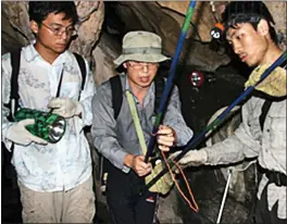  ??  ?? POOR PROTECTION: Internet pictures, since deleted, of Wuhan researcher­s capturing bats in the wild and in the caves where Covid-19 started
