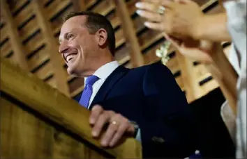  ?? Melissa Sue Gerrits/Getty Images ?? Rep. Ted Budd, R-N.C., celebrates his Republican nomination at a primary election night watch party Tuesday in Bermuda Run, N.C. Mr. Budd is running for the U.S. Senate seat being vacated by retiring Sen. Richard Burr, R-N.C.