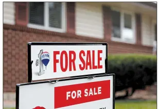  ?? AP ?? As existing-home sales surged in February, median sale prices rose 3.6 percent from the same period last year.
