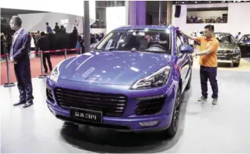  ??  ?? SHANGHAI: A Zotye SR9 car pictured during the media day of the 17th Shanghai Internatio­nal Automobile Industry Exhibition in Shanghai. —AFP