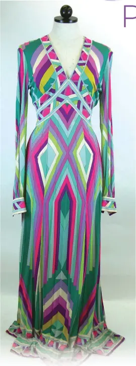  ?? [PHOTO PROVIDED BY UCO] ?? Left: Multi-color geometric print V-neck gown with contrastin­g border around hem, cuffs, bust and neckline from the 1970s by Leonard Paris.