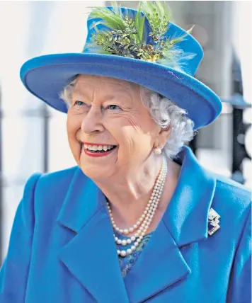  ??  ?? The Queen unveiled a plaque, top left, marking the centenary of GCHQ’S founding at Watergate House. Left, the royal code puzzle