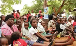  ??  ?? Women and children at an HIV testing and counsellin­g gala in Jambezi in Hwange district.