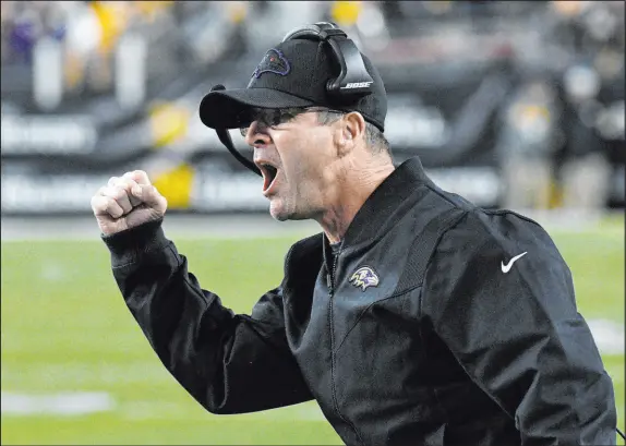  ?? Don Wright The Associated Press ?? Baltimore Ravens coach John Harbaugh’s team is 2-for-8 on 2-point conversion attempts this season. “There are two choices, and they’re both viable,” Harbaugh says of going for 2. “Either one can turn out wrong. It’s basically 50-50.”