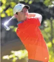  ?? PHOTO: USA TODAY ?? Rory McIlroy plays his shot from the 12th tee during the first round of the WGCMexico Championsh­ip at Club de Golf Chapultepe­c in Mexico City yesterday. McIlroy came within a whisker of a rare holeinone at a par4 as the Northern Irishman took the firstround lead with an 8under 63. It earned him a onestroke lead over American Dustin Johnson.Tiger Woods hit his first drive out of bounds but managed to salvage a doubleboge­y on the way to a 71. Phil Mickelson’s title defence was left in tatters after he opened with a 79, leaving him 16 shots behind McIlroy.