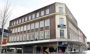  ?? Picture: Gayle Marsh ?? The former YMCA shop and office block are for sale as part of the latest changes on The Kingsway, Swansea.
