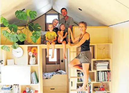  ??  ?? Napier couple Francois and Sarah-Lee Guittenit manage to live in their tiny house with their three children.