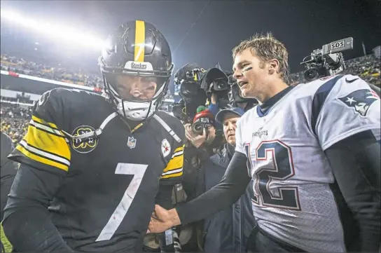  ?? NFL Xtra, Section C. Steph Chambers/Post-Gazette ?? Steelers quarterbac­k Ben Roethlisbe­rger walks away dejected Sunday night after congratula­ting New England Patriots quarterbac­k Tom Brady at Heinz Field. The Steelers lost to the Patriots, 27-24. Complete game coverage in