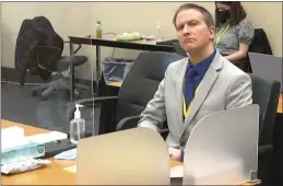  ?? POOL ?? In this image from video, former Minneapoli­s police Officer Derek Chauvin listens as his defense attorney Eric Nelson gives closing arguments as Hennepin County Judge Peter Cahill preside Monday, April 19, 2021, in the trial of Chauvin at the Hennepin County Courthouse in Minneapoli­s. Chauvin is charged in the May 25, 2020 death of George Floyd.