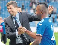  ??  ?? Steven Gerrard with Alfredo Morelos