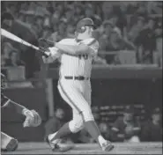  ?? RON FREHM - THE ASSOCIATED PRESS ?? FILE - In this May 1, 1984, file photo, Rusty Staub, pinch hitting for the New York Mets, watches his sixth inning hit to right field against the Chicago Cubs at Shea Stadium in New York. Staub, who became a huge hit with baseball fans in two countries...