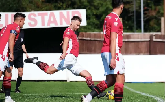  ?? Picture: Bristol Manor Farm FC ?? Owen Howe strikes the free-kick which gave Bristol Manor Farm an early lead against AFC Totton