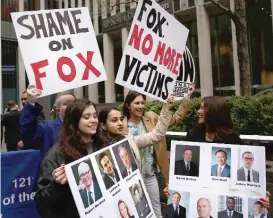  ?? | SPENCER PLATT/ GETTY IMAGES ?? Members of the National Organizati­on for Women ( NOW) protest outside of Fox headquarte­rs last Thursday.
