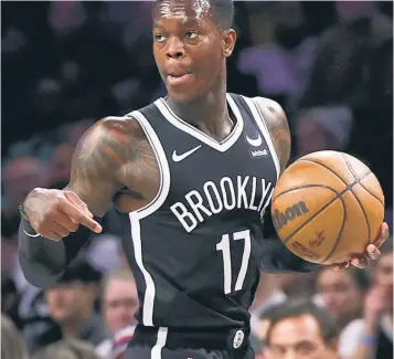  ?? AP ?? GETTING TO KNOW YOU: Nets guard Dennis Schroder, who impressed off the bench in his franchise debut on Saturday, got in some practice time with his new teammates ahead of a homeand-home against the Celtics.