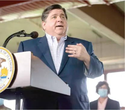  ?? JUSTIN FOWLER/STATE JOURNAL-REGISTER VIA AP ?? Gov. J.B. Pritzker speaks March 24 at a press conference on health care equity.