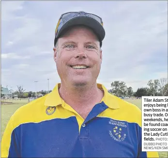  ?? DUBBO PHOTO NEWS/KEN SMITH ?? Tiler Adam Stiles enjoys being his own boss in a busy trade. On weekends, he can be found coaching soccer on the Lady Cutler fields. PHOTO: