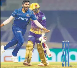  ?? PTI ?? Jasprit Bumrah of Mumbai Indians celebratin­g the wicket of Sunil Narine of Kolkata Knight Riders, during a match at DY Patil Stadium in Mumbai on Monday.