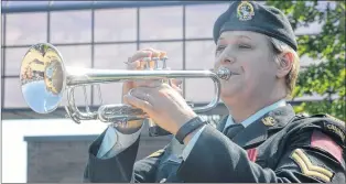  ?? JOE GIBBONS/THE TELEGRAM ?? Cpl. Stephanie Furey, CD of the Royal Newfoundla­nd Regiment band, performed the “Last Post” and “Reveille” at the Merchant Navy Memorial Service held at the Marine Institute in St. John’s on Thursday.