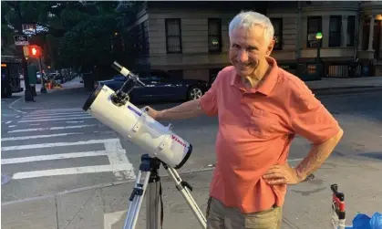  ?? ?? Joe Delfausse and his telescope on the corner of Ninth Street and Eighth Avenue in Brooklyn, New York. Photograph: Joe Delfausse