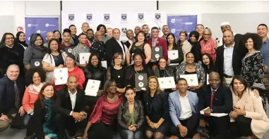  ??  ?? PROUD MOMENT: UWC graduates of 2018 with lecturers and DSD officials.