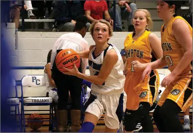  ?? Siandhara Bonnet/News-Times ?? Player of the Year finalist: Parkers Chapel's Ali Looney takes the ball to the basket in action against Hampton this season. Looney is a finalist for News-Times/Sports Alley Girls Basketball Player of the Year.