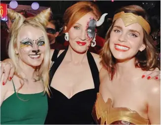  ?? ?? Casting a spell: Evanna Lynch, JK Rowling and Emma Watson at a party