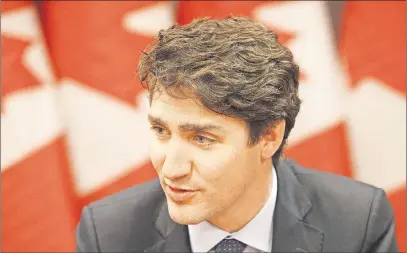  ??  ?? Prime Minster Justin Trudeau participat­es in a roundtable with the Council of India Societies of Edmonton, in Edmonton on Saturday.