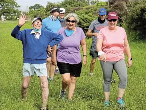  ?? Picture: MATTHEW FIELD ?? OUT AND ABOUT: Residents enjoy the warm weather as they begin last week’s Sunrise-On-Sea parkrun. The 400th run will take place this weekend