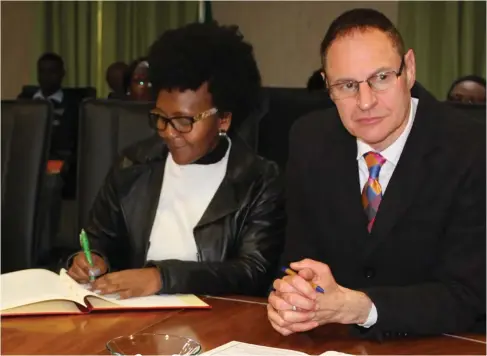  ??  ?? The principal of the NSG, Professor Richard Levin, signs the MoU with the founder of the TMF, Ms Ndileka Mandela.