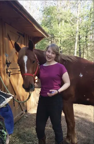  ?? PHOTO PROVIDED ?? From her barn in Shokan, N.Y., Annie VanKleeck, daughter of Phoenicia Elementary School teacher Sharon McInerney, shows her mother’s students in one of their virtual field trips how she tacks up her horse, Dudley, for Western riding.