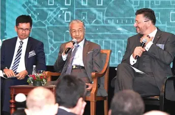  ?? — Bernama photo ?? Dr Mahathir (centre) during the dialogue with the French business community.