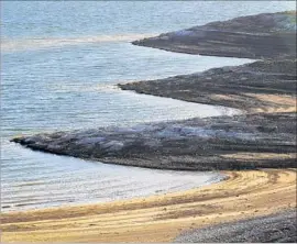  ?? Brian van der Brug Los Angeles Times ?? WESTLANDS Water District officials voted last week not to take part in the governor’s proposal. Above, the San Luis Reservoir supplies water to the district.