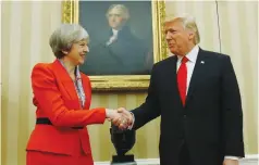  ?? (Kevin Lamarque/Reuters) ?? US PRESIDENT Donald Trump meets with British Prime Minister Theresa May at the White House in Washington on Friday.