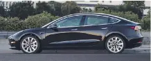  ??  ?? CEO and founder Elon Musk will add the first Tesla Model 3 to his collection. The car rolled off the production line Friday.
